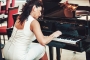 Gabriela Gini Pianist / Vocalist